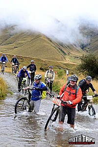 Back to wheels this year for Gerard, but some carrying rather than riding. Man, it was wet and muddy!