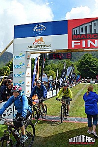 Shane across the line, 15 minutes ahead of Gerard, but same course time of 4:36